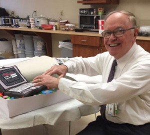 Dr-Bismayer-with-his-retirement-cake-2016-OHC